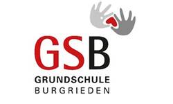 Das Bild zeigt das Logo der Grundschule Burgrieden mit den Buchstaben "GSB" und zwei stilisierten grauen Händen, die ein rotes Herz formen.